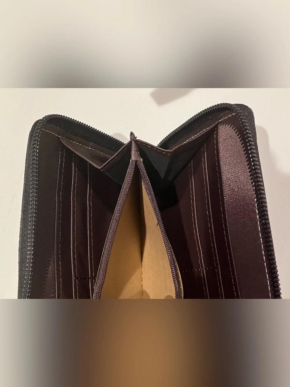 Western-themed zip-around wallet cowboy riding horse sunset
